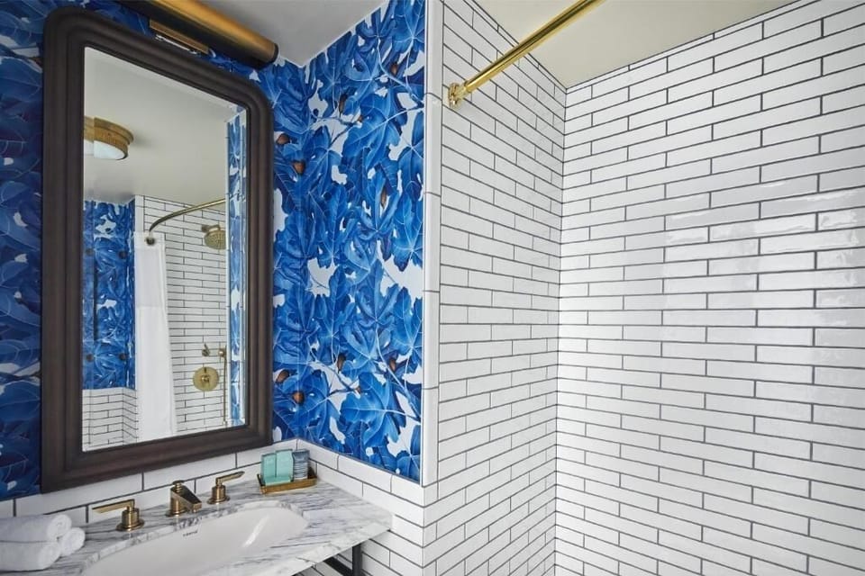 Step into a bright, tiled bath with boutique-hotel style.