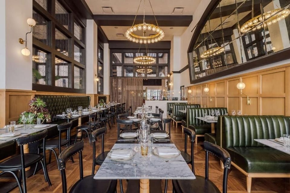 Savor leisurely dinners in a chic, warmly lit dining room.