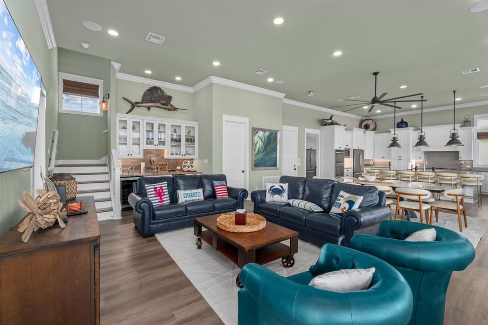 Spacious living area with plush seating and modern finishes – perfect for large groups and family vacations