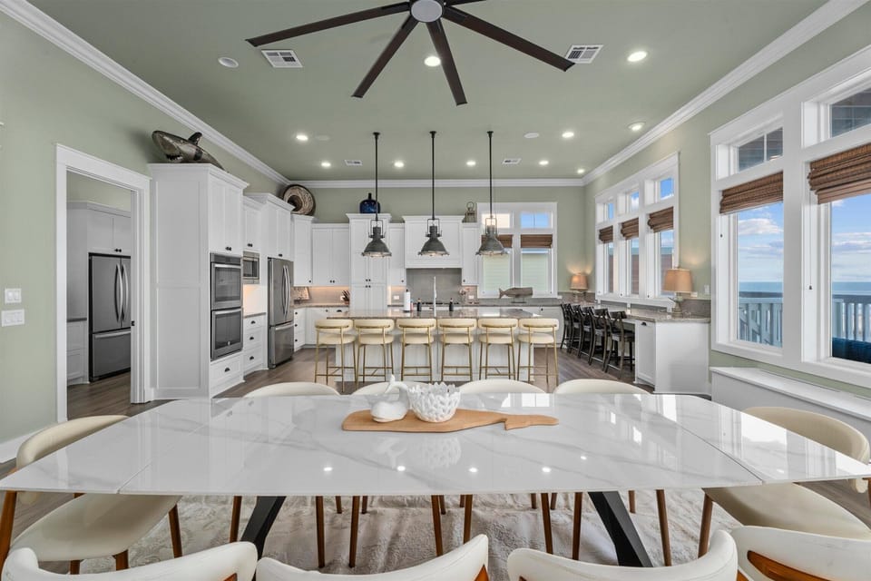 Bright kitchen with bar seating and open floor plan – perfect for entertaining and family meals