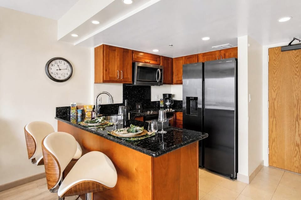 Fully equipped kitchen with bar seating for easy meals and entertaining