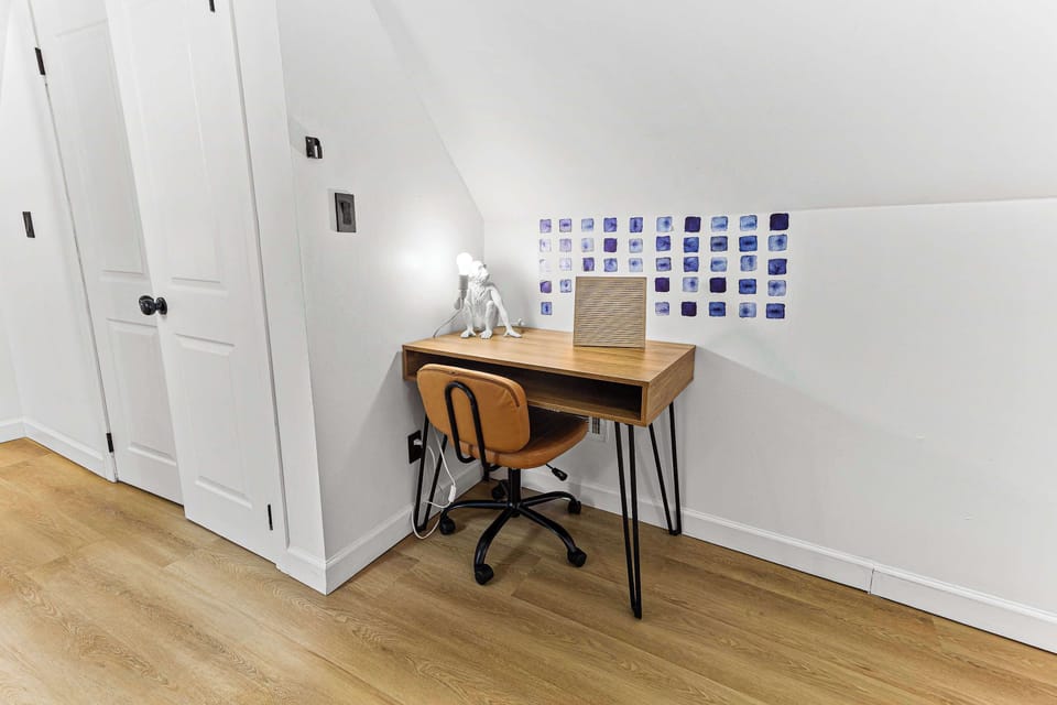 A convenient workspace inside the bedroom makes it easy to catch up on emails, plan your trip, or enjoy a productive remote work moment.