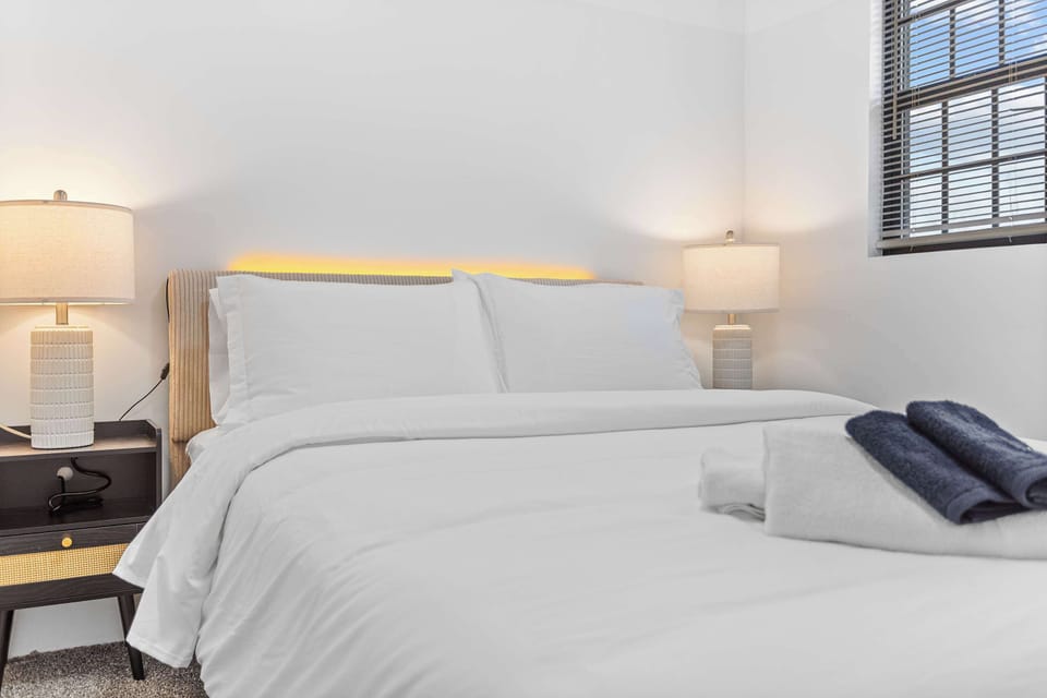 Enjoy a cozy and inviting space with a plush bed, ideal for relaxing and recharging after a day of adventure.
