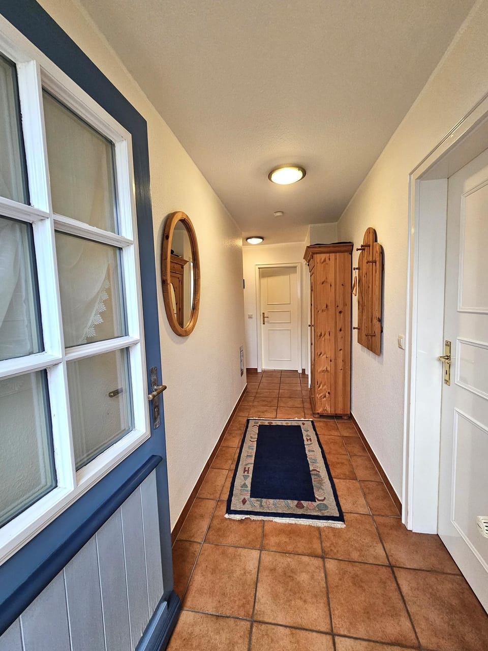 View of the entrance area with hallway and wardrobe.
