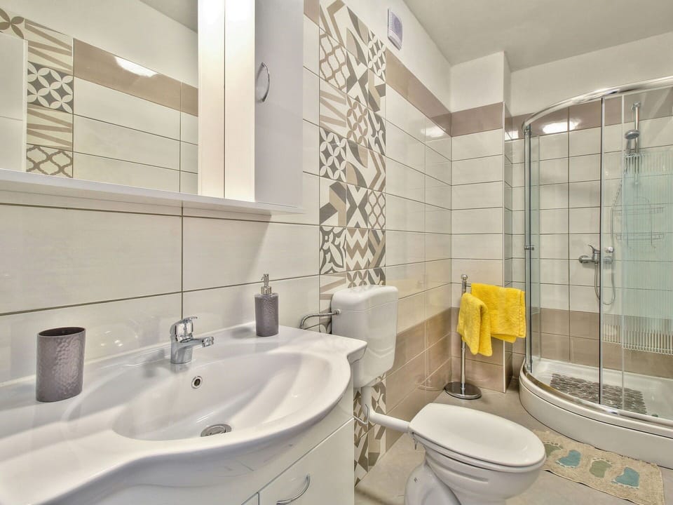 Flooring, Floor, Interior Design, Plumbing Fixture, Ceiling, Bathroom, Room, Plumbing, Toilet, Tile