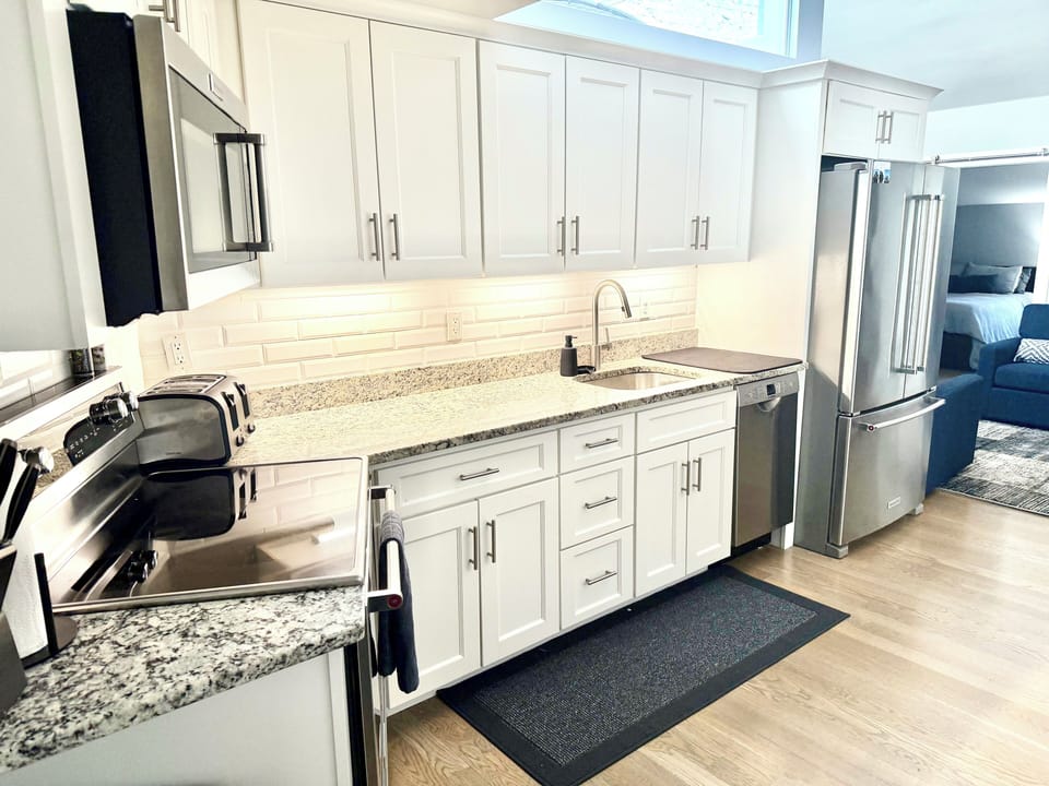 Oven, Keurig, microwave, fridge, toaster, and dishwasher.  