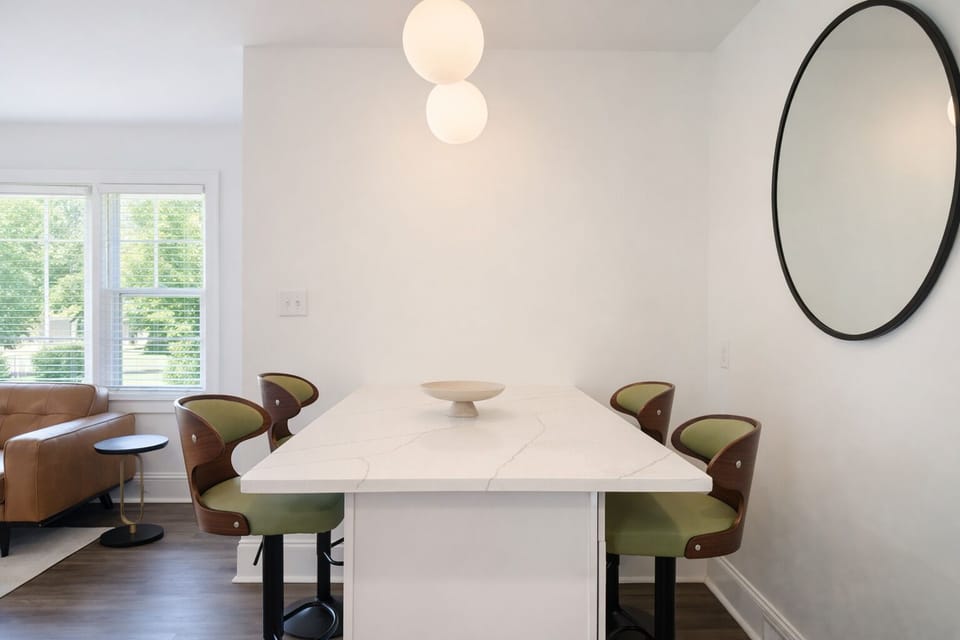 Counter for four, bright light, warm glow. Easy meals, work, relax.