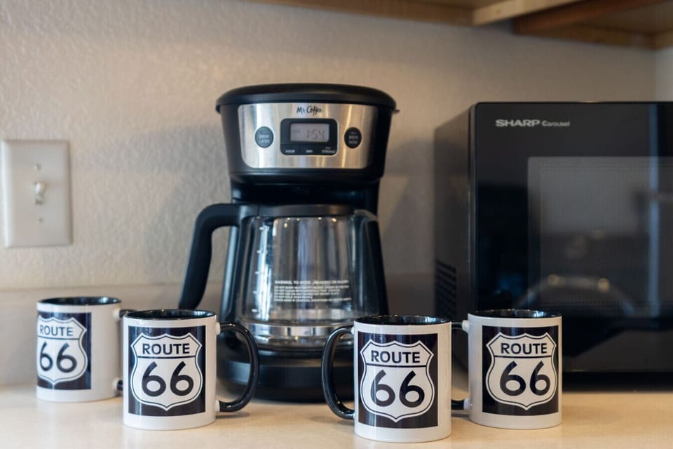 Route 66 mugs and coffee setup add a fun start to your morning.