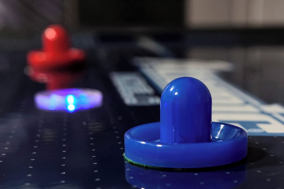 Challenge friends to epic air hockey battles in this vibrant game zone!