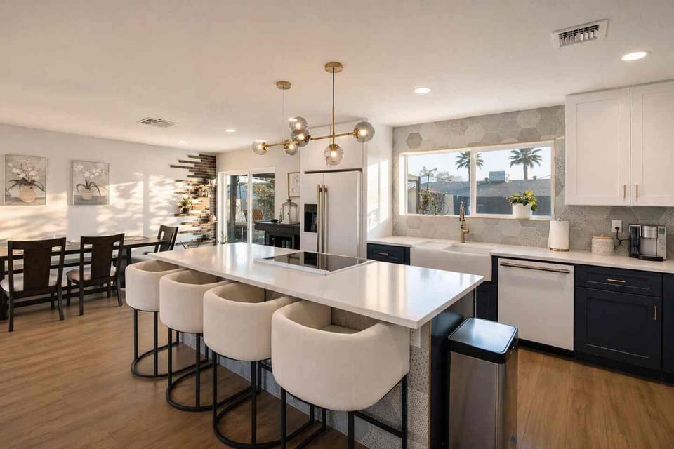 From quick breakfasts to evening appetizers, the oversized island naturally becomes everyone's favorite gathering place.