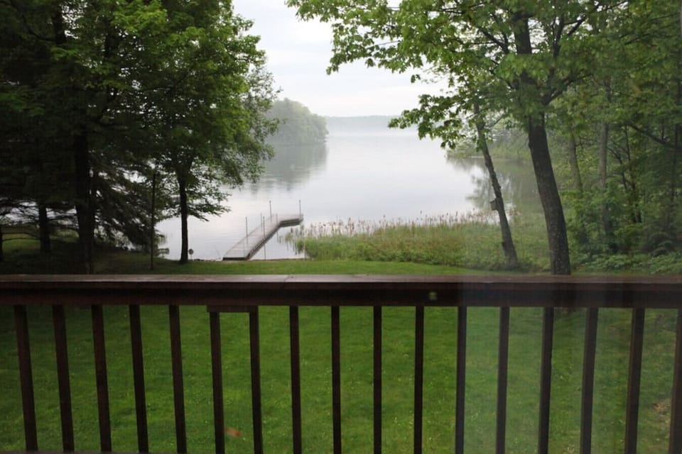 Step onto your private deck and soak in the serene lake views, where peaceful waters and a charming dock await your morning coffee moments.