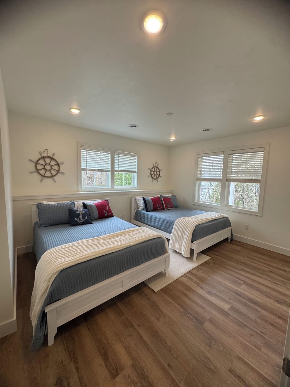 Two queen beds with separate bathroom.