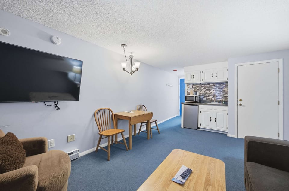 Keep drinks & snacks tucked away in the cozy kitchenette​
