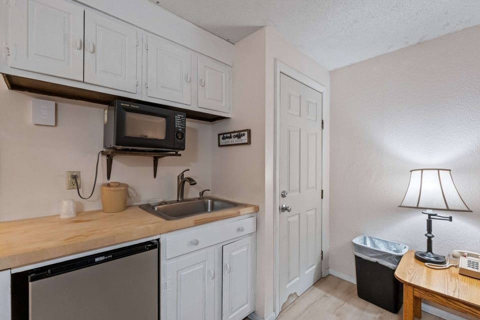 The cozy kitchenette is ideal for drinks & quick bites​