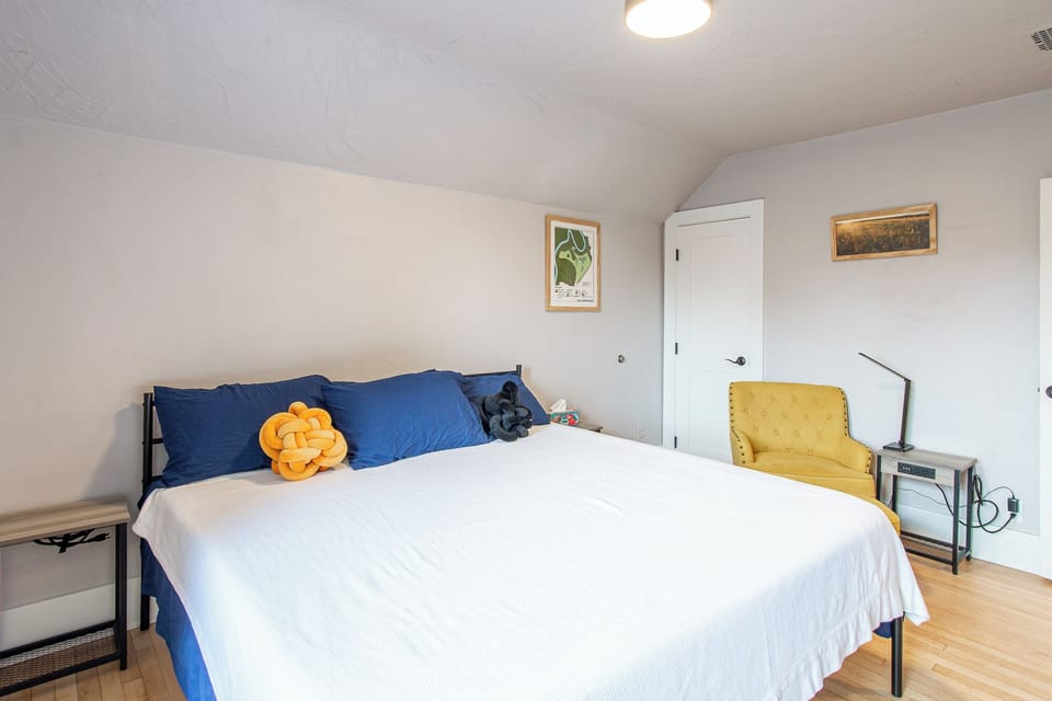 [Bedroom 1, upstairs] King bed with closet for storage 