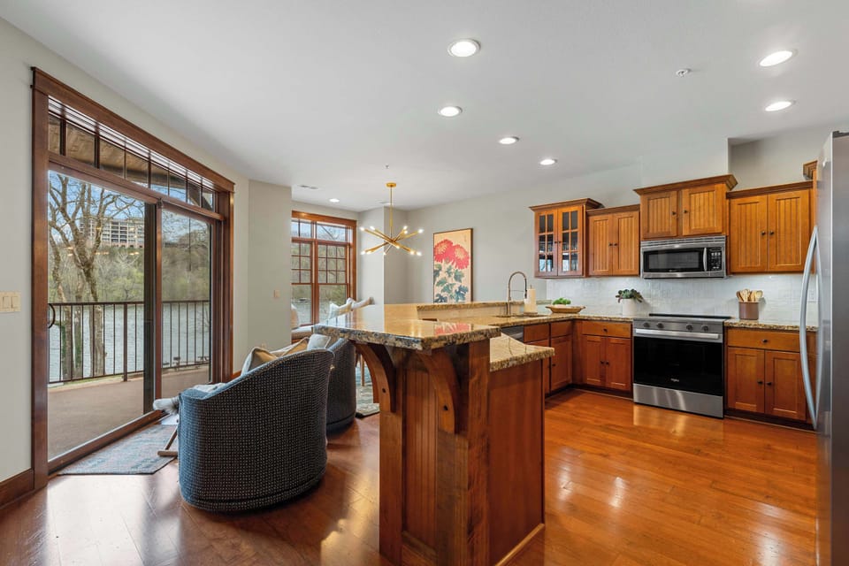 Step down the hallway to the kitchen!