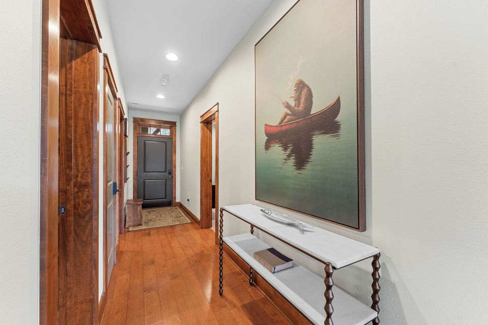 Head back toward the front of the condo to the bedrooms!