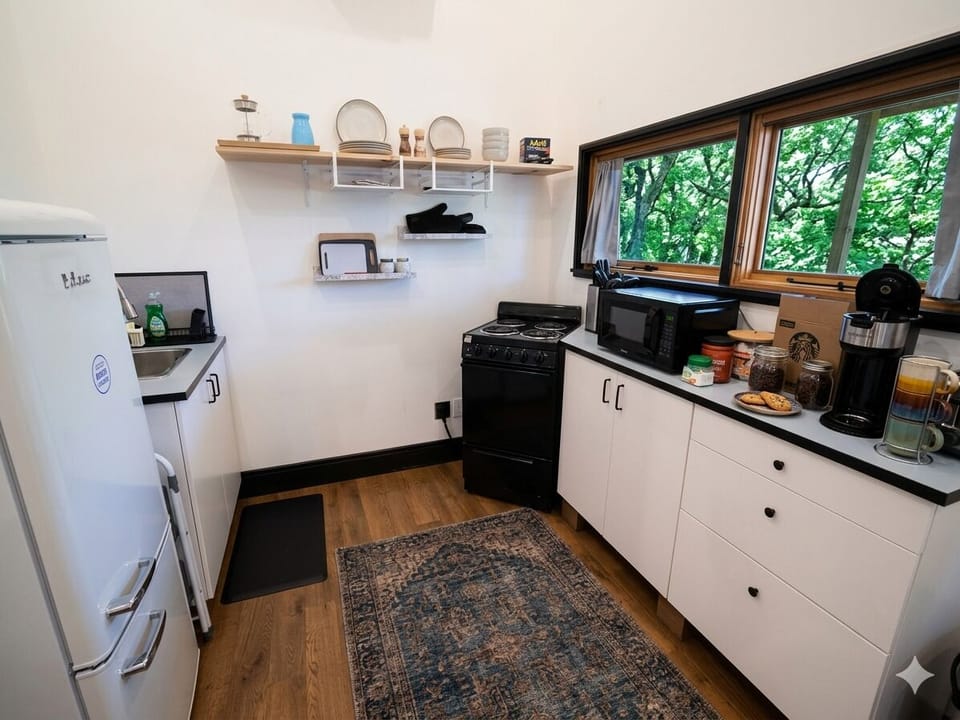 Modern kitchen space stocked with essentials for a comfortable Austin visit