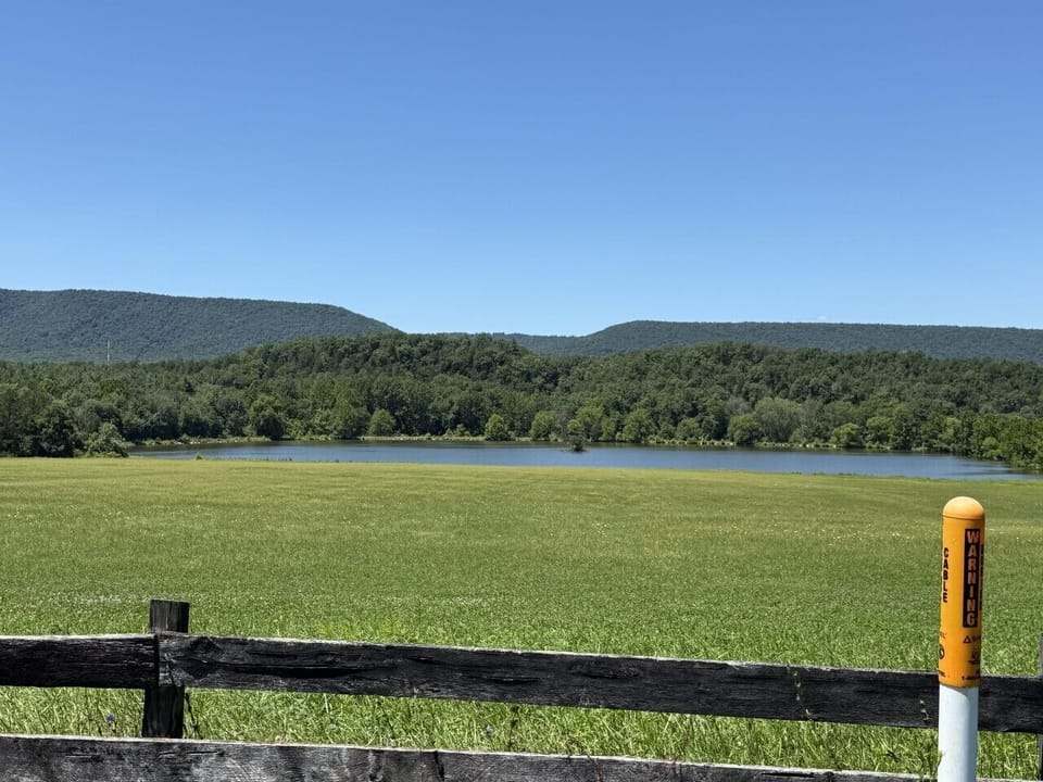 One of the property`s most unforgettable features is its sweeping view of the private lake framed by the mountains—a peaceful backdrop that changes beautifully throughout the day.