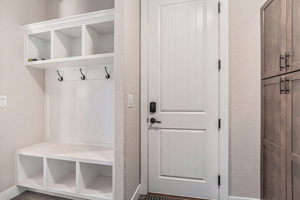 Step inside to a welcoming entry designed for ease, with plenty of space to drop bags, hang coats, and settle in, making arrivals effortless and departures just as smooth after a memorable stay. Also includes the washer and dryer.
