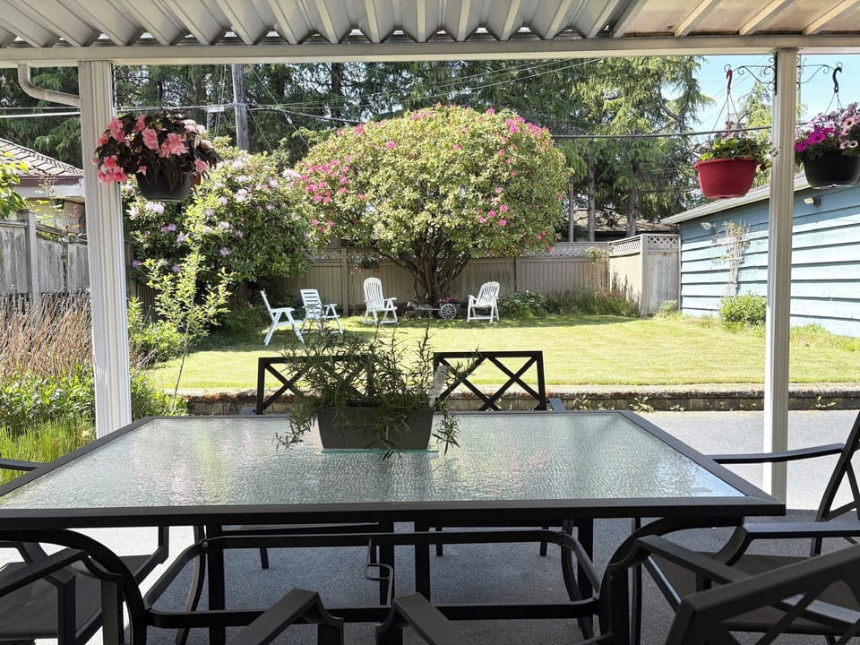 Beautiful back yard garden, large patio for relaxation.