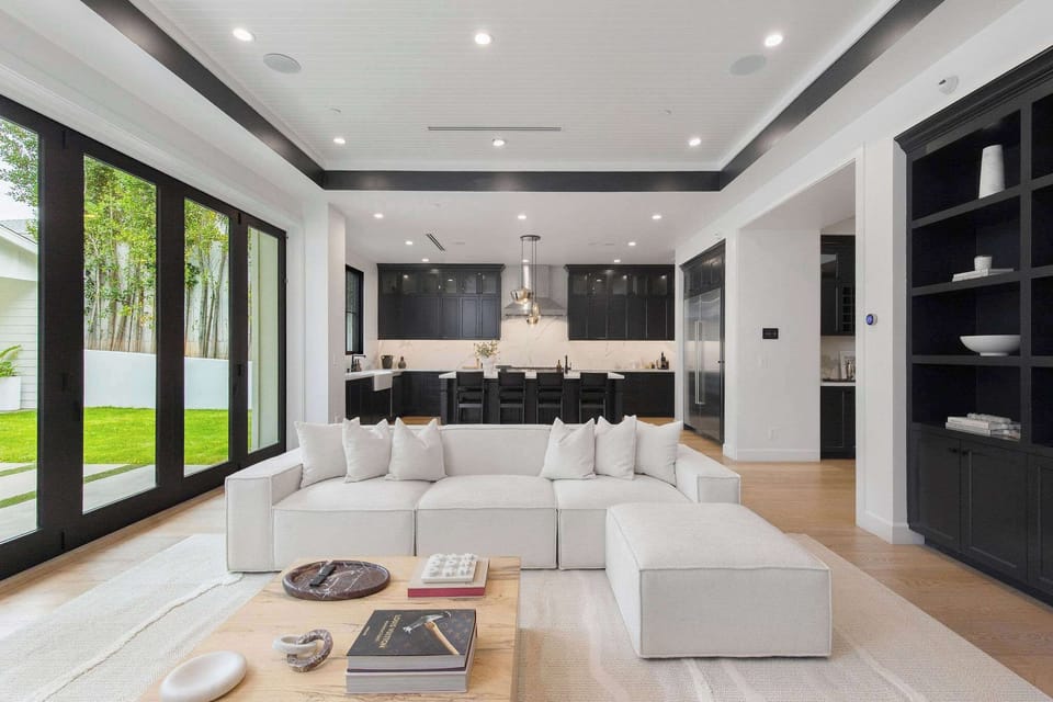 A light-filled family room with expansive windows and seamless indoor-outdoor flow