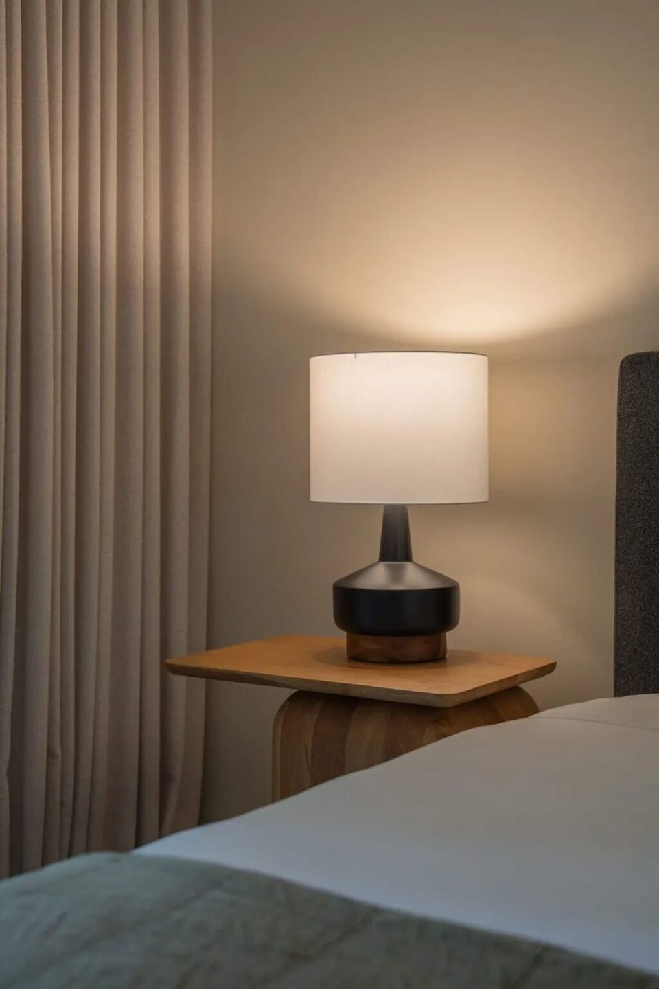 Unwind under warm bedside light after a beach day.