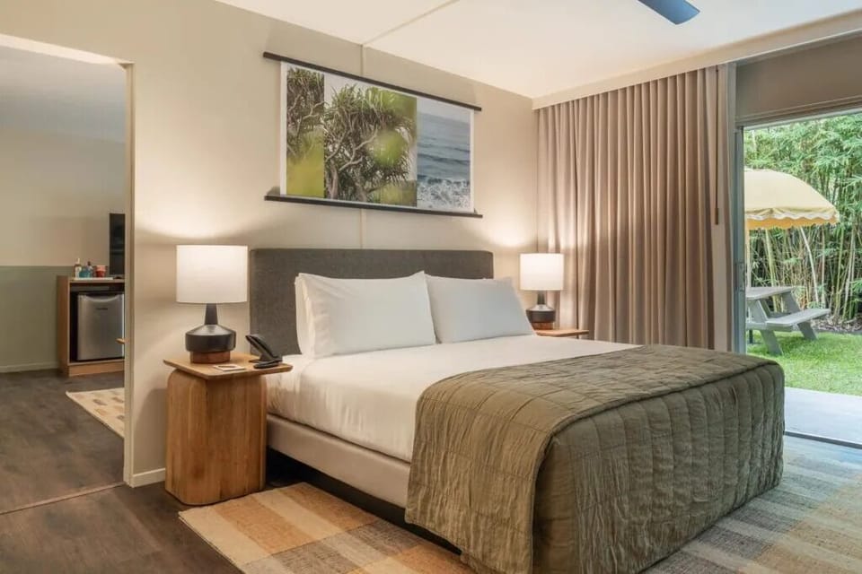 Wake up refreshed with soft lighting and calming artwork.
