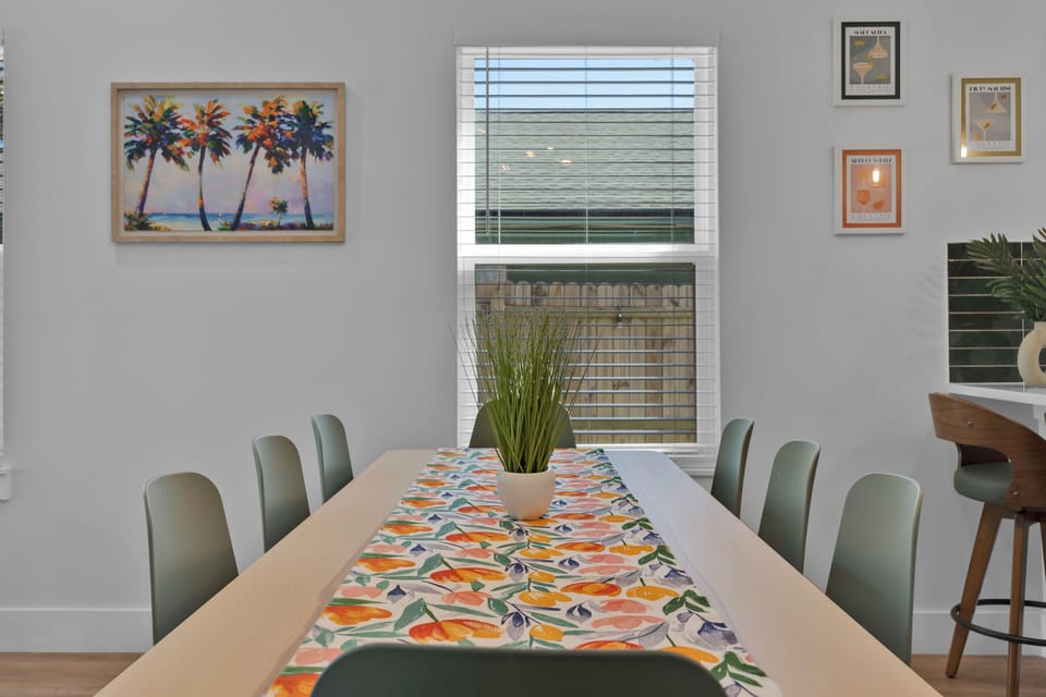 Dining Room - table with seating for 8, kids table with seating for 4, high chair.