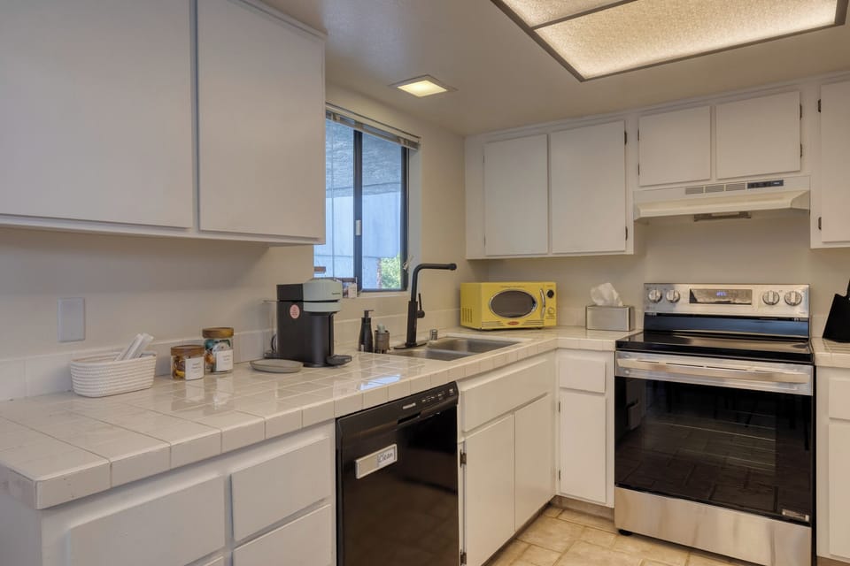 Your fully equipped kitchen features modern appliances, ample counter space, and everything you need to prepare delicious meals during your stay.