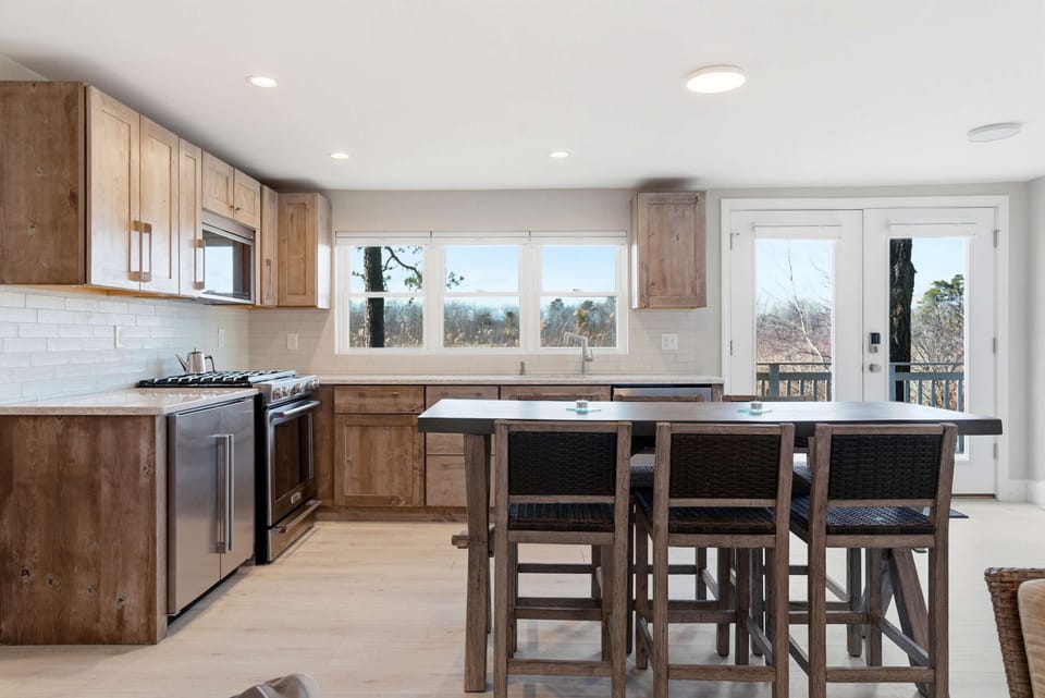 The open kitchen offers ample space & all the comforts of home​