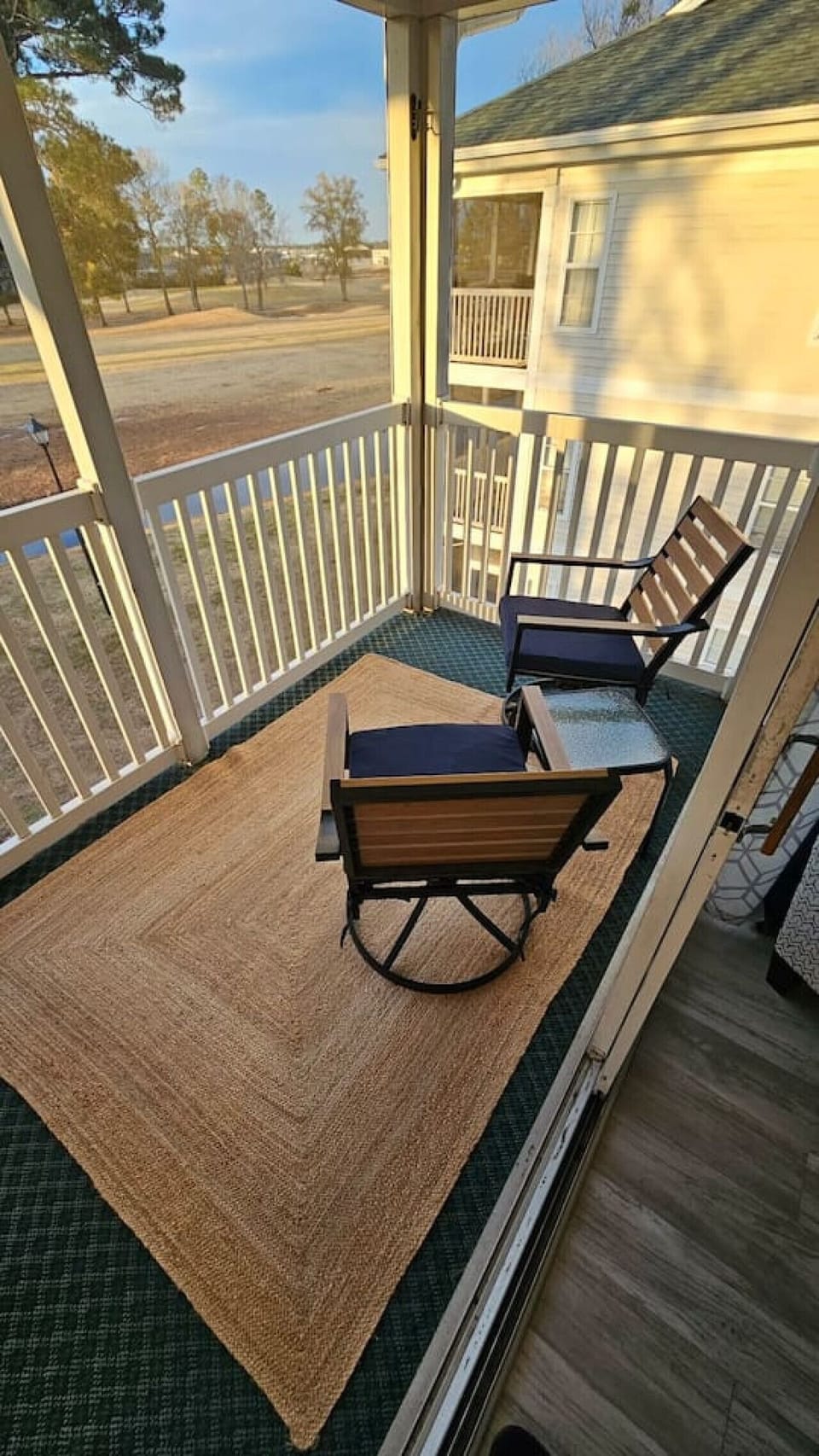 Private BalconyCharming private balcony offering soothing views of a small, natural stream.