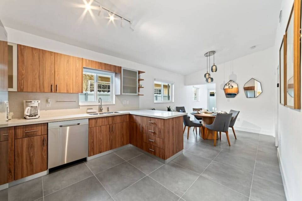 Kitchen: Modern clean lines meet a soft, inviting ambiance.