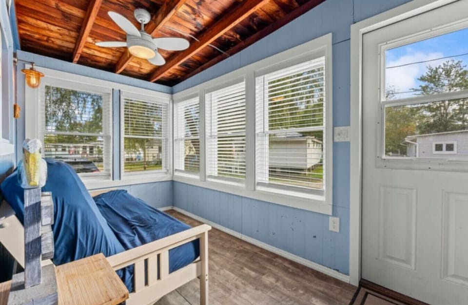 Sunroom | Full Futon | Window Blinds & Glass Door Access