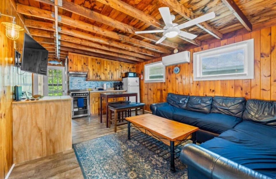 Living Room | Leather Sectional Sofa | Ceiling Fan & Wall Mounted TV