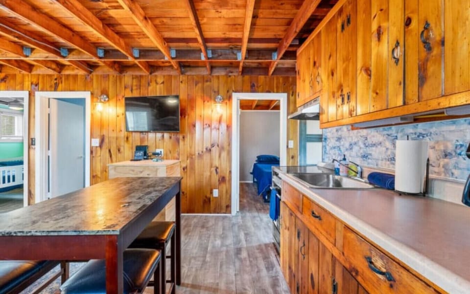 Kitchen | Kitchen Island | Stainless Sink & Wall Mounted TV