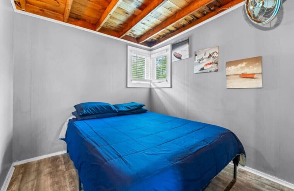 Bedroom 2 | Queen Bed | Corner Windows & Wall Art