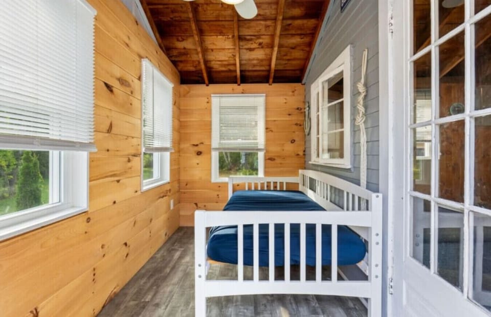 Sun Porch | Twin Day Bed | Window Wall & Wood Paneling