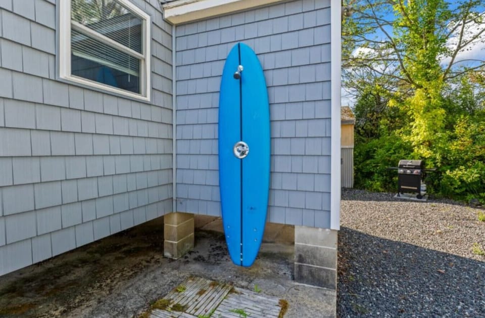 Outdoor Shower | Surfboard Rack | Gravel Ground & Exterior Wall