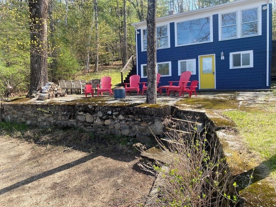 Patio, leading down to the beach/lake. There's now a steel handrail for stairs.