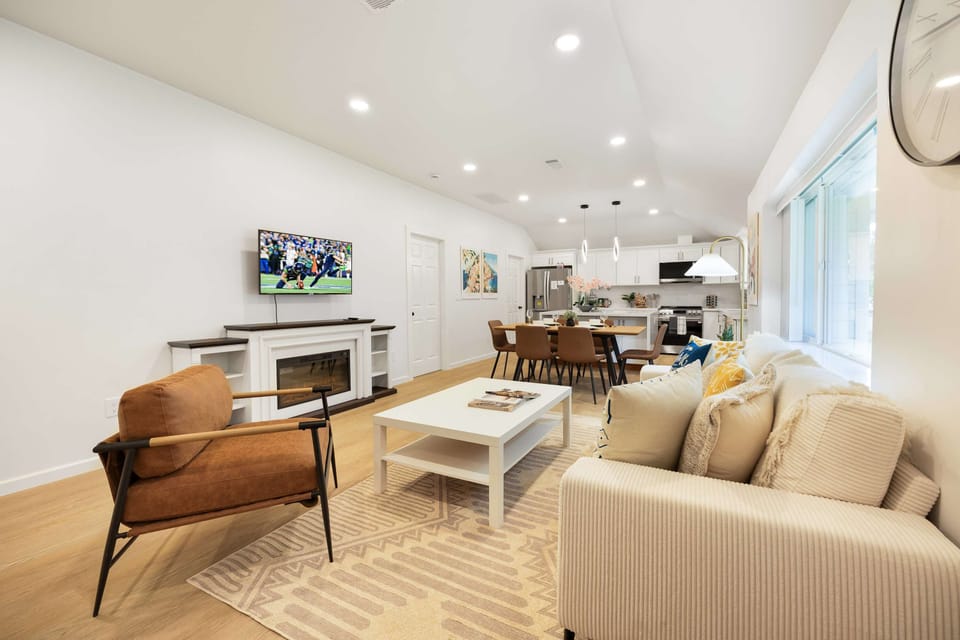 Bright and inviting gathering space with modern furnishings and plenty of natural light.