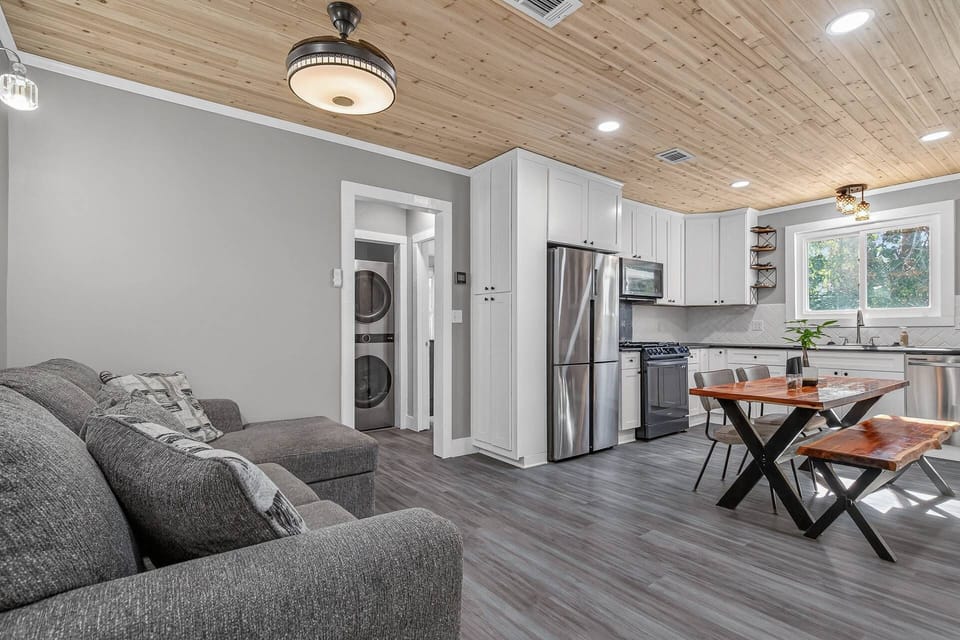 Open living area and kitchen with dining table