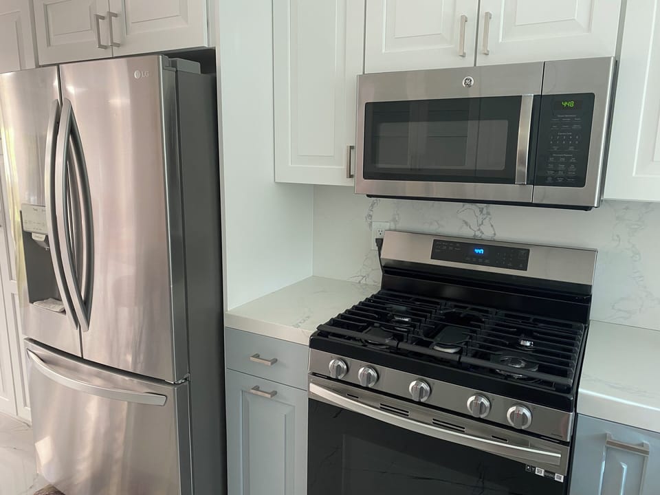 Gas range and side by side refrigerator