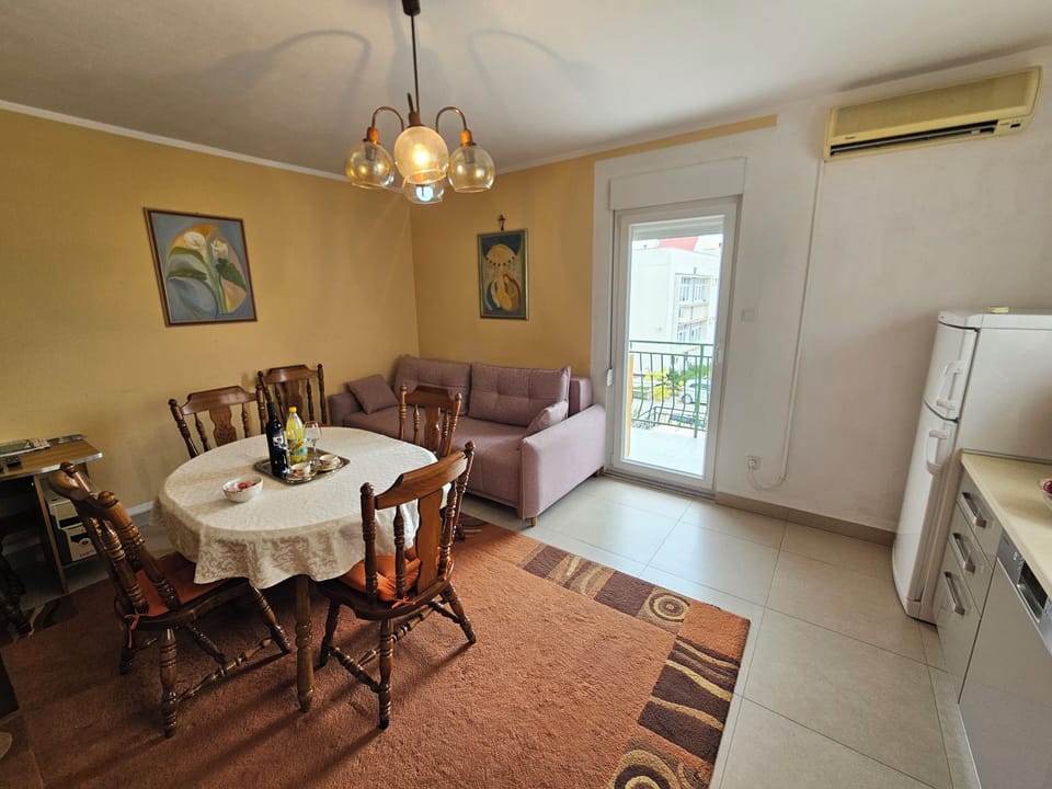 Living room with balcony access.