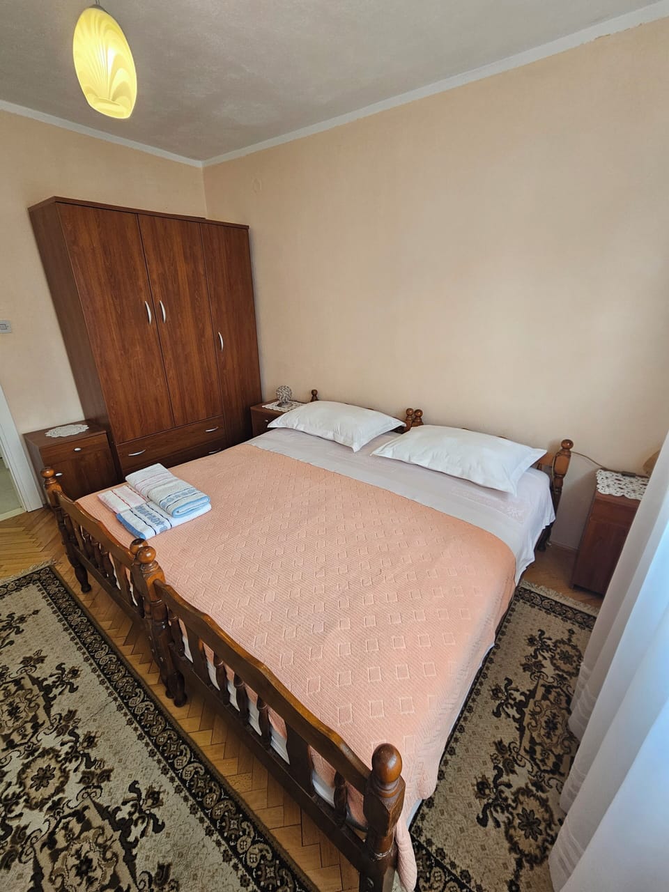 Bedroom with king size bed and closet. 