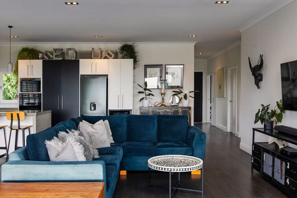 Open plan living, dining and kitchen, with beautiful ocean views