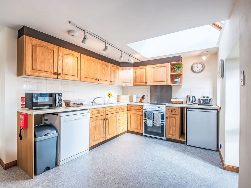 Kitchen, Major Appliance, Kitchen Appliance, Wood, Countertop, Interior Design, Ceiling, Furniture, Cabinetry, Room