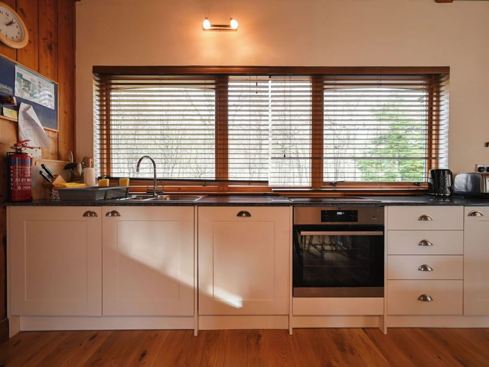 Wood, Kitchen, Interior Design, Countertop, Flooring, Cabinetry, Kitchen Appliance, Lighting, Furniture, Home