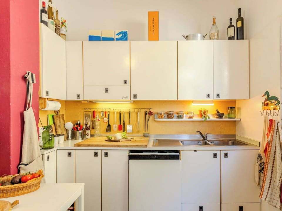 Kitchen Appliance, Kitchen, Countertop, Major Appliance, Interior Design, Cabinetry, Wood, Flooring, Yellow, Room