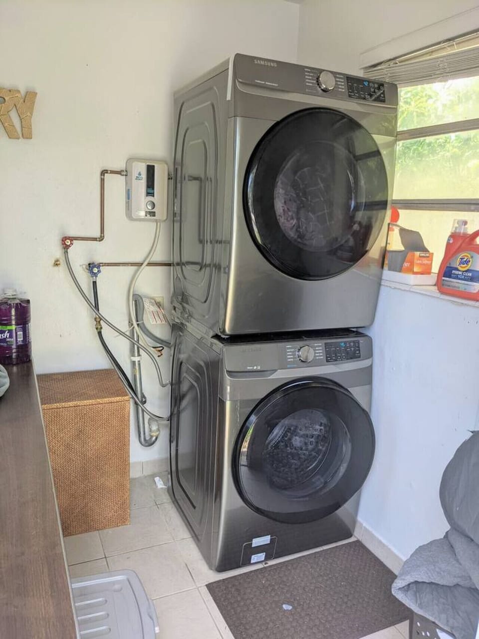 Laundry Room: Experience the ultimate in space-saving luxury without sacrificing power or performance.